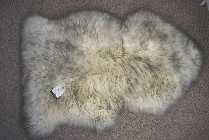 Ivory Grey Tipped Sheepskin Rug on Floor